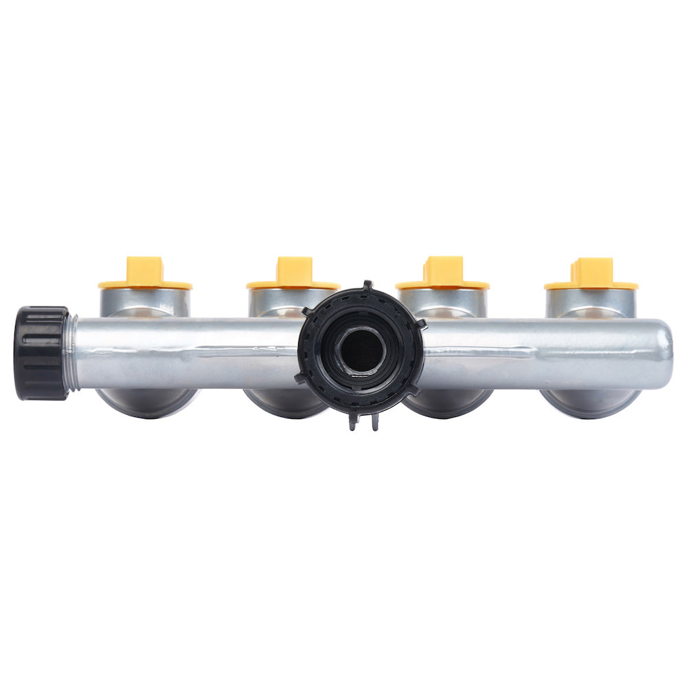 This image shows a gray manifold with four outlets, each with a yellow valve on top, and a black center connection point, likely for a heating system.