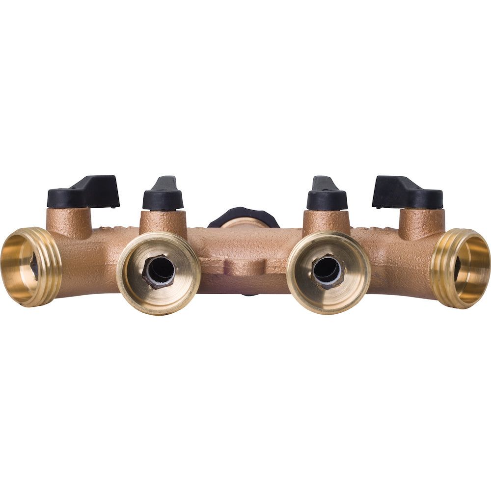 This is a brass plumbing manifold with multiple ports and black valves. Used for distributing water to various outlets, the fittings are symmetrical and robust.
