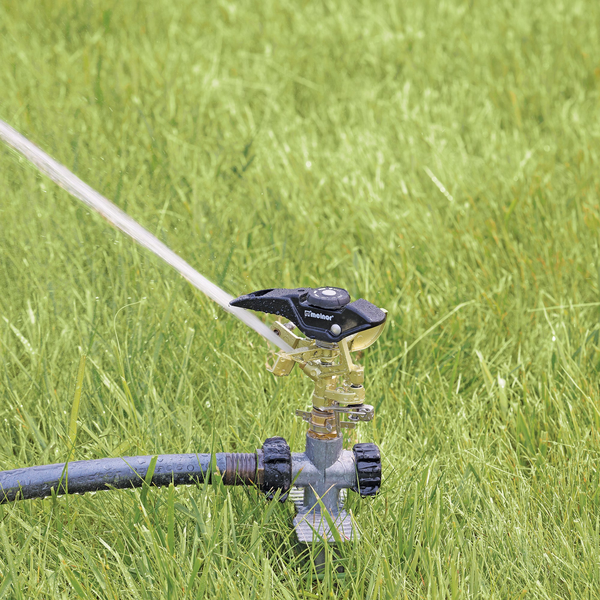 メノロン Metal Pulsating Sprinkler with 3-Prong Step Spike – Melnor