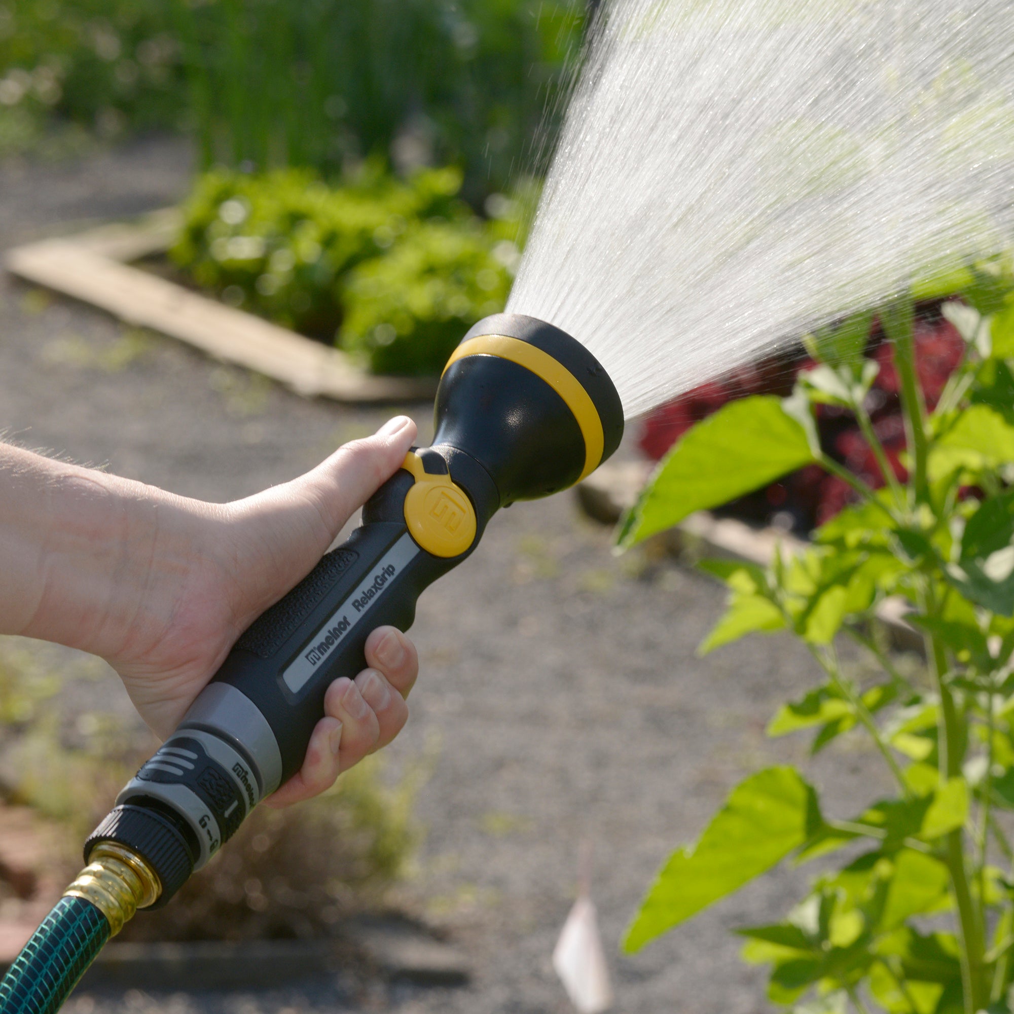 RelaxGrip® Thumb-Control Straight Shower Nozzle