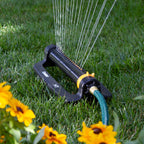 XT4000 Melnor 4,000 Sq. Ft. Turbo Oscillating Sprinkler gently watering lawn