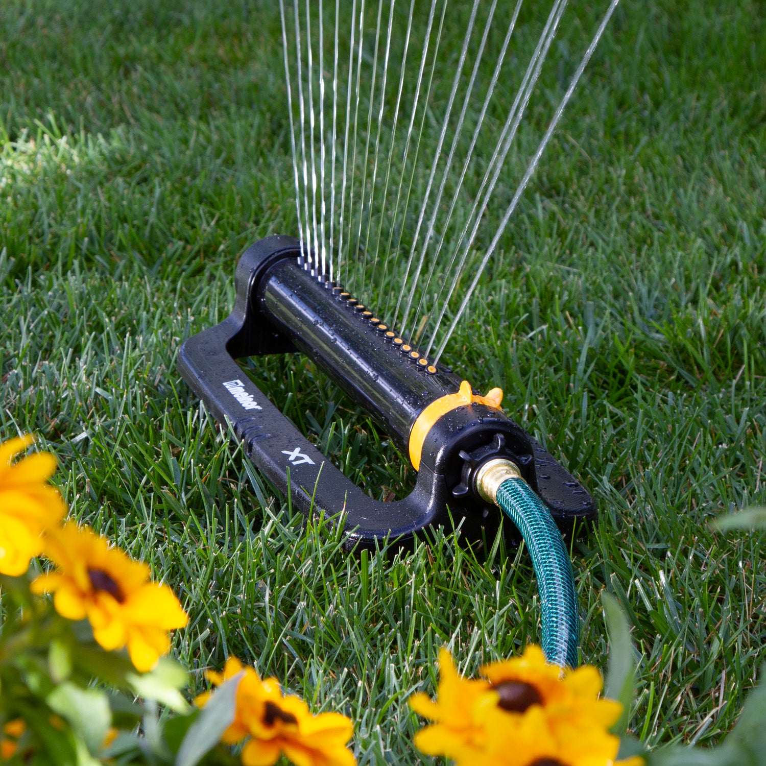 XT4000 Melnor 4,000 Sq. Ft. Turbo Oscillating Sprinkler gently watering lawn