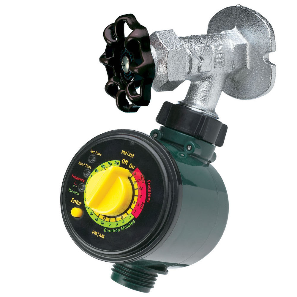 This is an image of a mechanical hose timer attached to a metal water faucet. The timer has a dial for setting the watering duration.