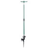 This image shows a green manual post hole digger with T-shaped handles, adjustable height settings, and a metallic earth-piercing end for digging holes in soil.